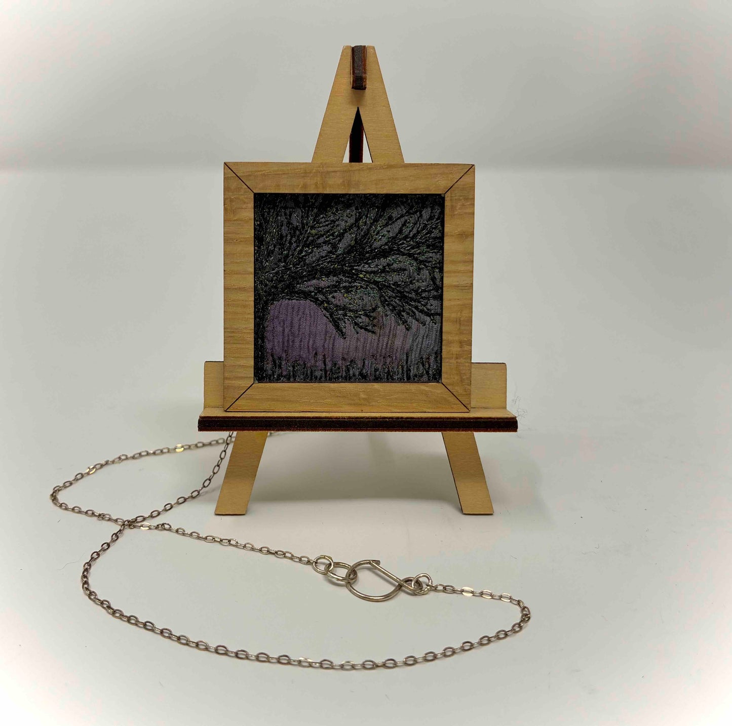NECKLACE THREADWORK on easel