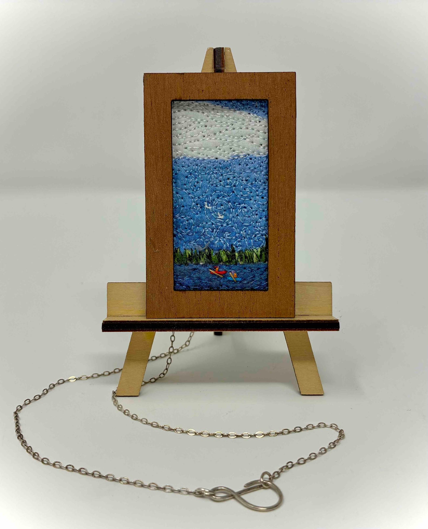 NECKLACE THREADWORK on easel