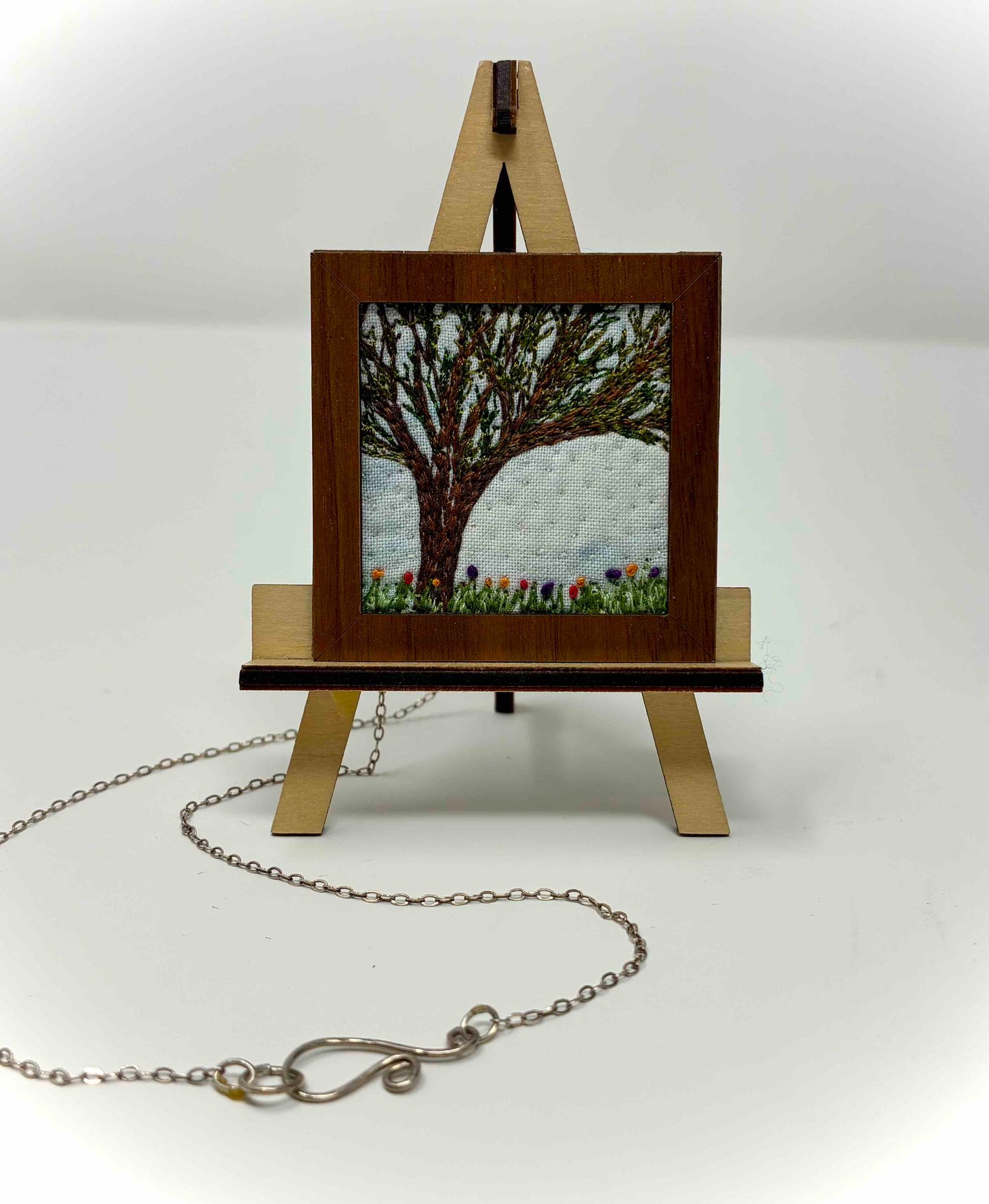 NECKLACE THREADWORK on easel