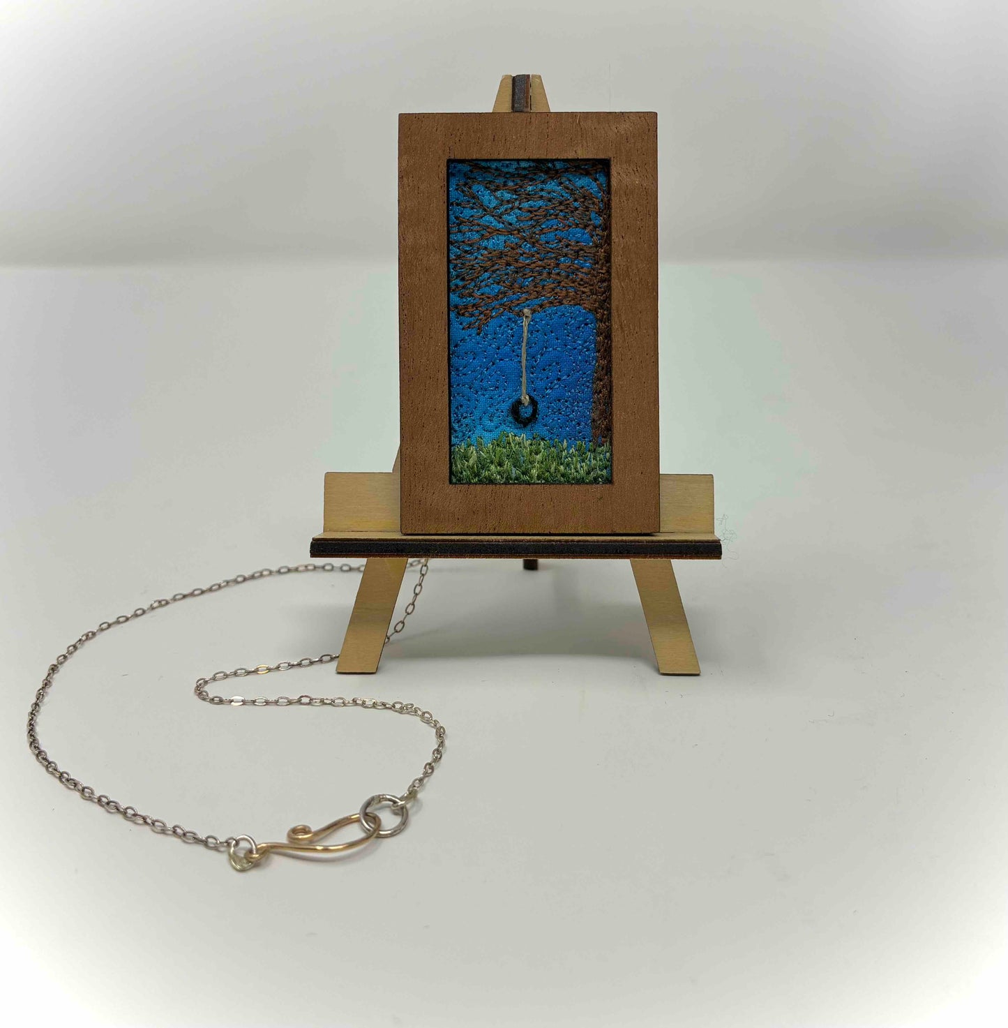 NECKLACE THREADWORK on easel